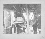 SA0509 - Photo of the interior of the chair making factory, picturing three men with various tools and machinery., Winterthur Shaker Photograph and Post Card Collection 1851 to 1921c